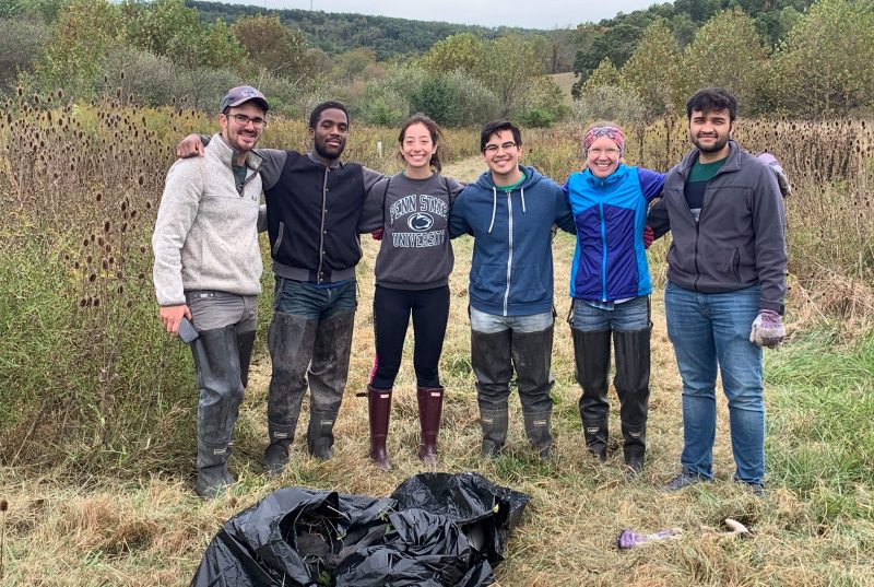 Katherine with fellow graduate students at a stream clean up