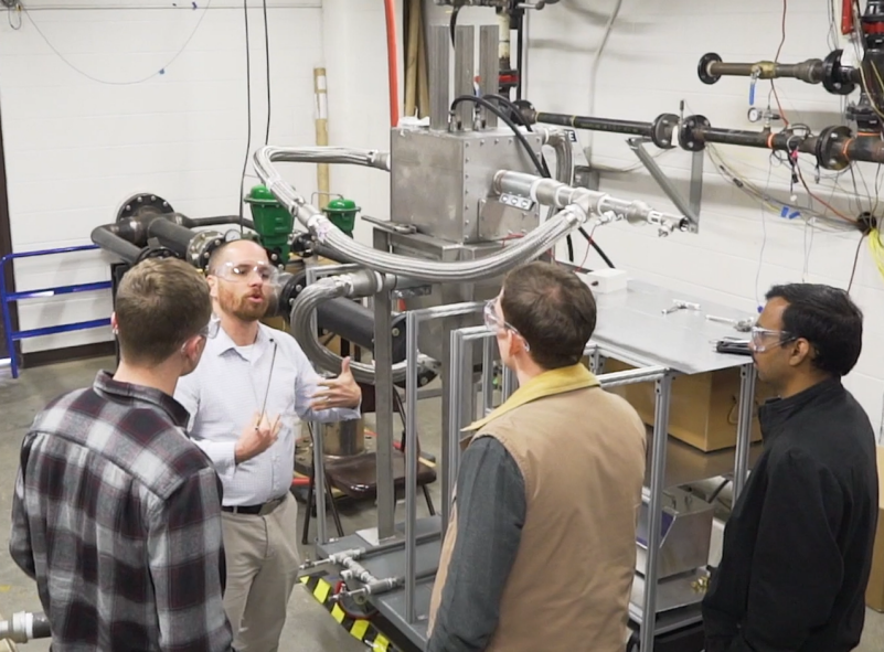 In a photo from 2019, the collaboration between Virginia Tech and MOVA led to testing of the design in the Advanced Propulsion and Power Laboratory in the College of Engineering. After testing, the Virginia Tech team believed that a successful proof-of-concept was achieved, confirming that the technology can capture gaseous and particulate matter pollutants.